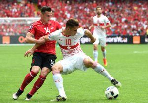 Switzerland's midfielder Granit Xhaka (R) challenges his brother Albania's midfielder Taulant Xhaka (L) during the Euro 2016 group A football match between Albania and Switzerland the Bollaert-Delelis Stadium in Lens on June 11, 2016. / AFP / FRANCOIS LO PRESTI (Photo credit should read FRANCOIS LO PRESTI/AFP/Getty Images)