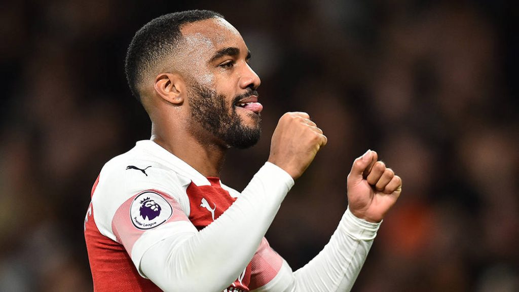 Arsenal's French striker Alexandre Lacazette celebrates scoring his team's second goal during the English Premier League football match between Arsenal and Newcastle United at the Emirates Stadium in London on April 1, 2019. (Photo by Glyn KIRK / AFP) / RESTRICTED TO EDITORIAL USE. No use with unauthorized audio, video, data, fixture lists, club/league logos or 'live' services. Online in-match use limited to 120 images. An additional 40 images may be used in extra time. No video emulation. Social media in-match use limited to 120 images. An additional 40 images may be used in extra time. No use in betting publications, games or single club/league/player publications. / (Photo credit should read GLYN KIRK/AFP/Getty Images)