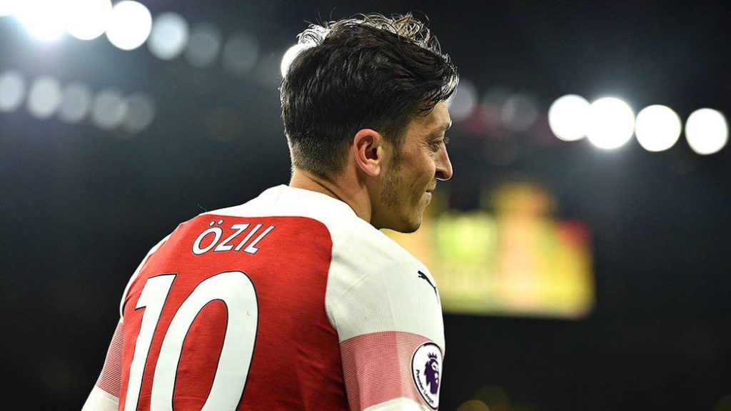 Arsenal's German midfielder Mesut Ozil reacts during the English Premier League football match between Arsenal and Newcastle United at the Emirates Stadium in London on April 1, 2019. (Photo by Glyn KIRK / AFP) / RESTRICTED TO EDITORIAL USE. No use with unauthorized audio, video, data, fixture lists, club/league logos or 'live' services. Online in-match use limited to 120 images. An additional 40 images may be used in extra time. No video emulation. Social media in-match use limited to 120 images. An additional 40 images may be used in extra time. No use in betting publications, games or single club/league/player publications. / (Photo credit should read GLYN KIRK/AFP/Getty Images)